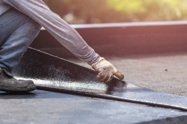 Professional Basement Waterproofing technician working in Moreland, GA